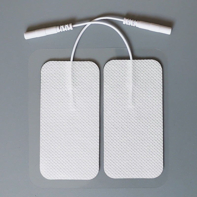 Replacement pads for Tens machine massager showing flexible silicone material