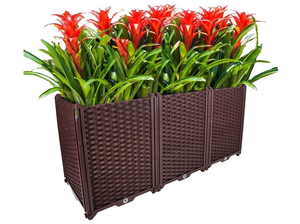 Close up of moisture maintenance system in garden planter box