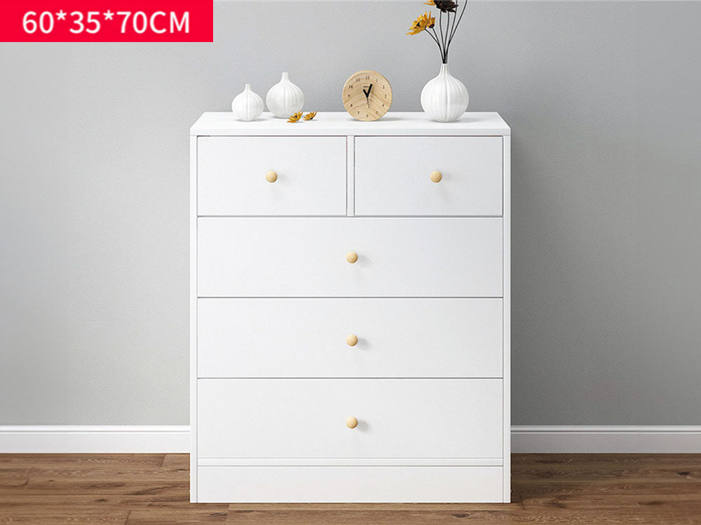 Back view of tallboy drawers showing particle board material