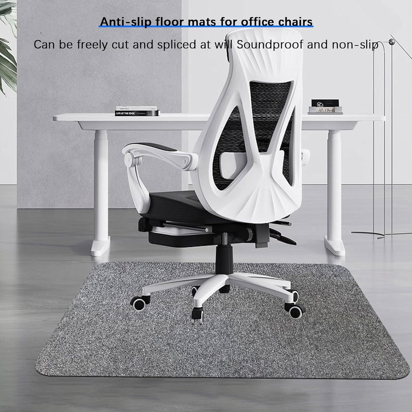 Light grey carpet chair mat with chair wheels rolling over