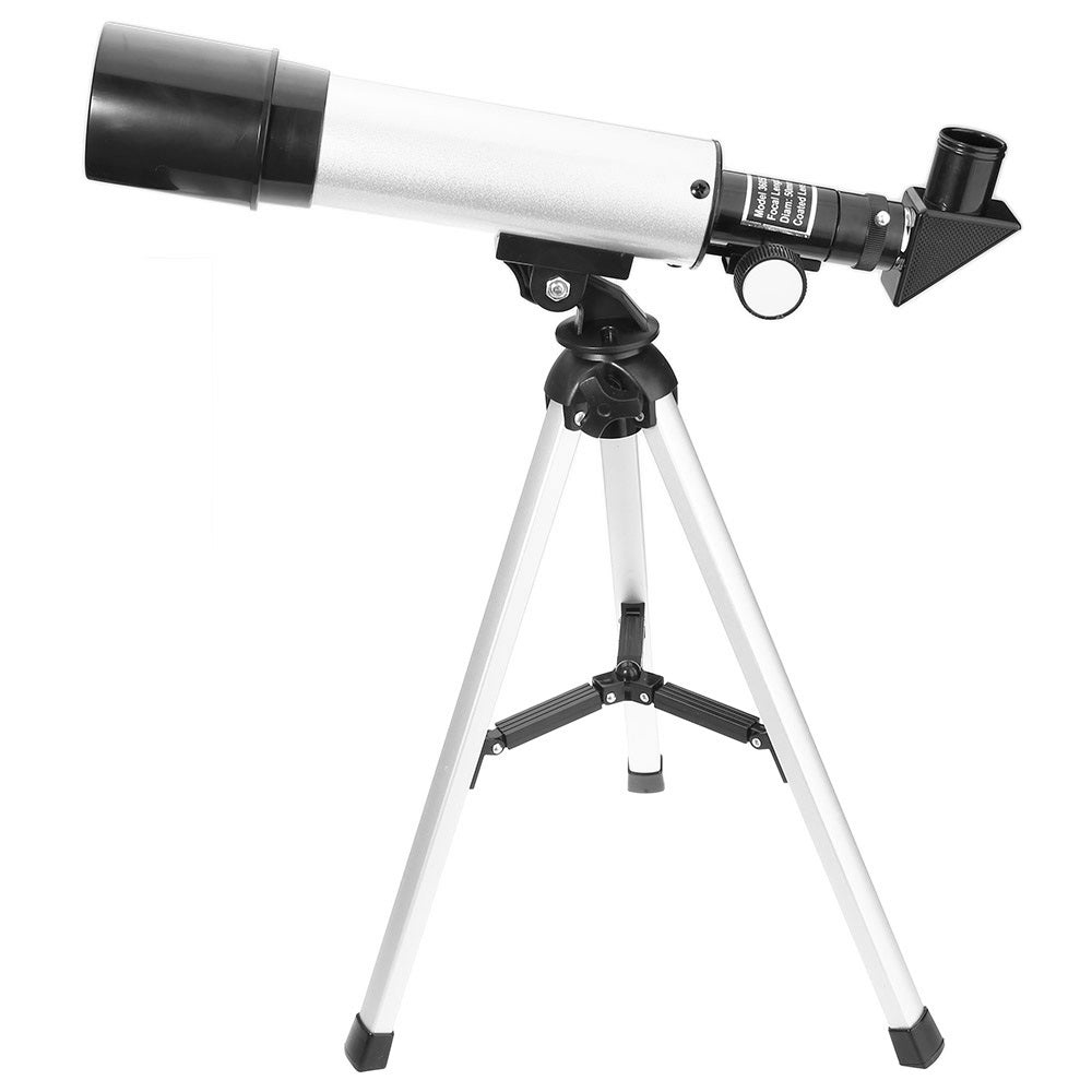 Silver astronomical telescope set up for beginner astronomy use