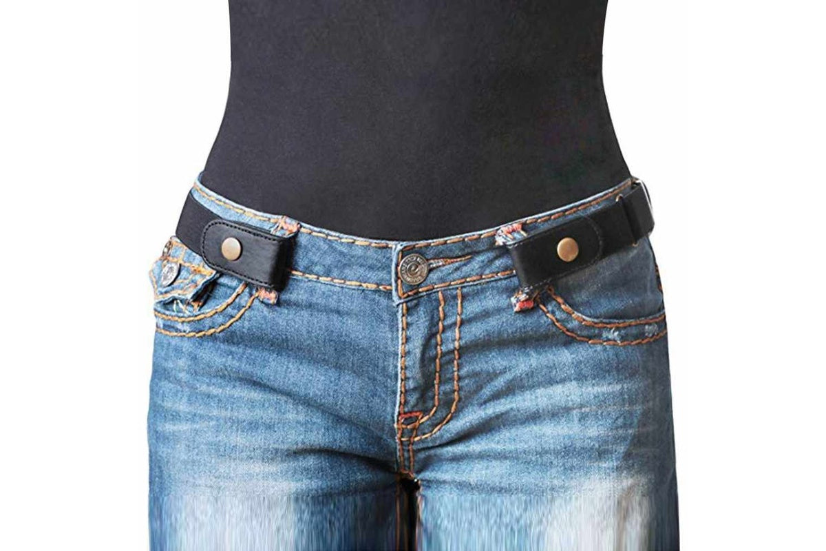 Side view of buckle-free belt on jeans waistband in black colour