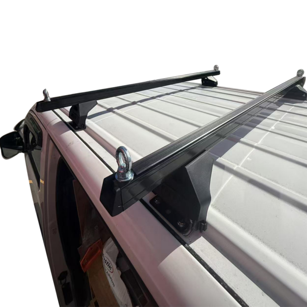 Car roof rack cross bar setup on 4WD for camping gear transport