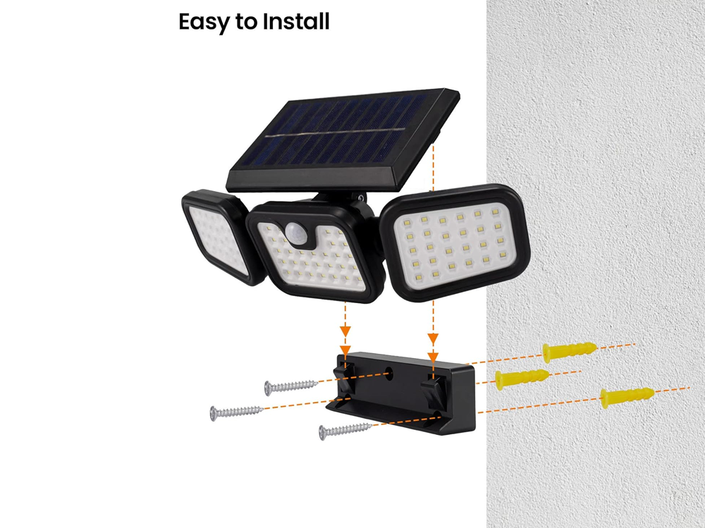 Solar motion sensor light installed near garage providing security lighting