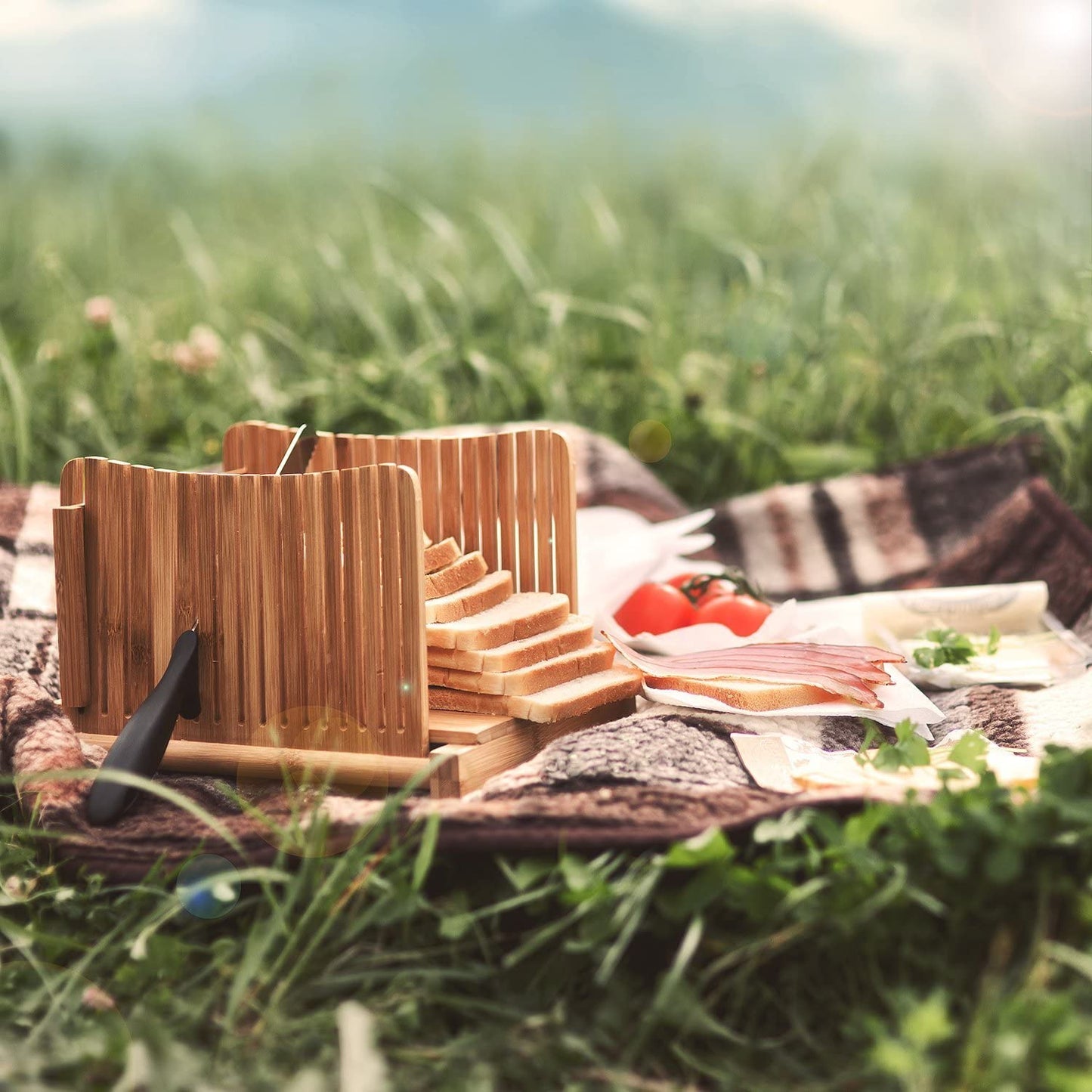 Bamboo bread slicer with baguette ready to slice