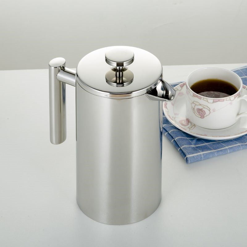 Coffee plunger with plunger pressed down ready to serve