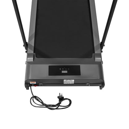 Compact treadmill showing speed settings on LED screen