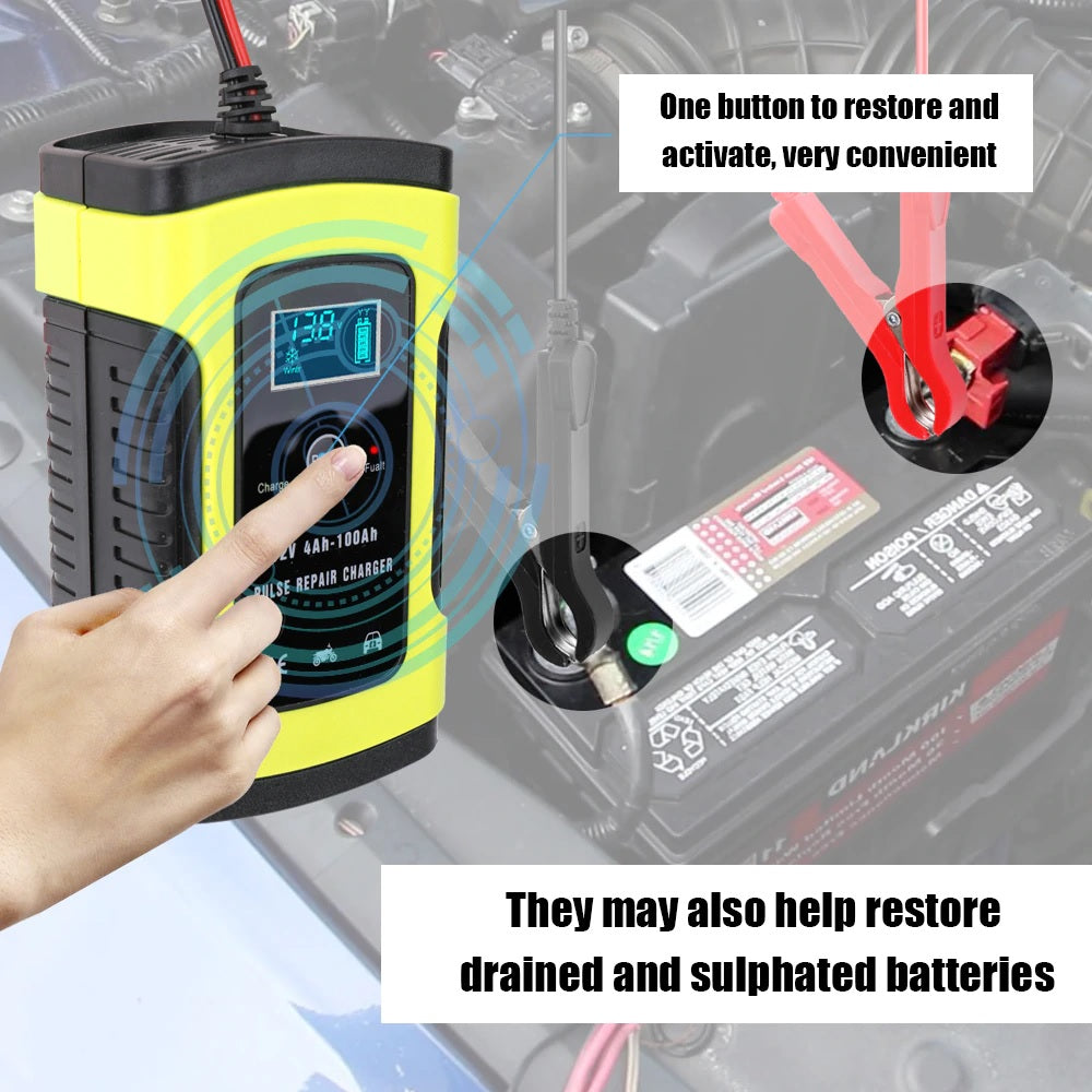Car battery charger placed on workshop bench with tools