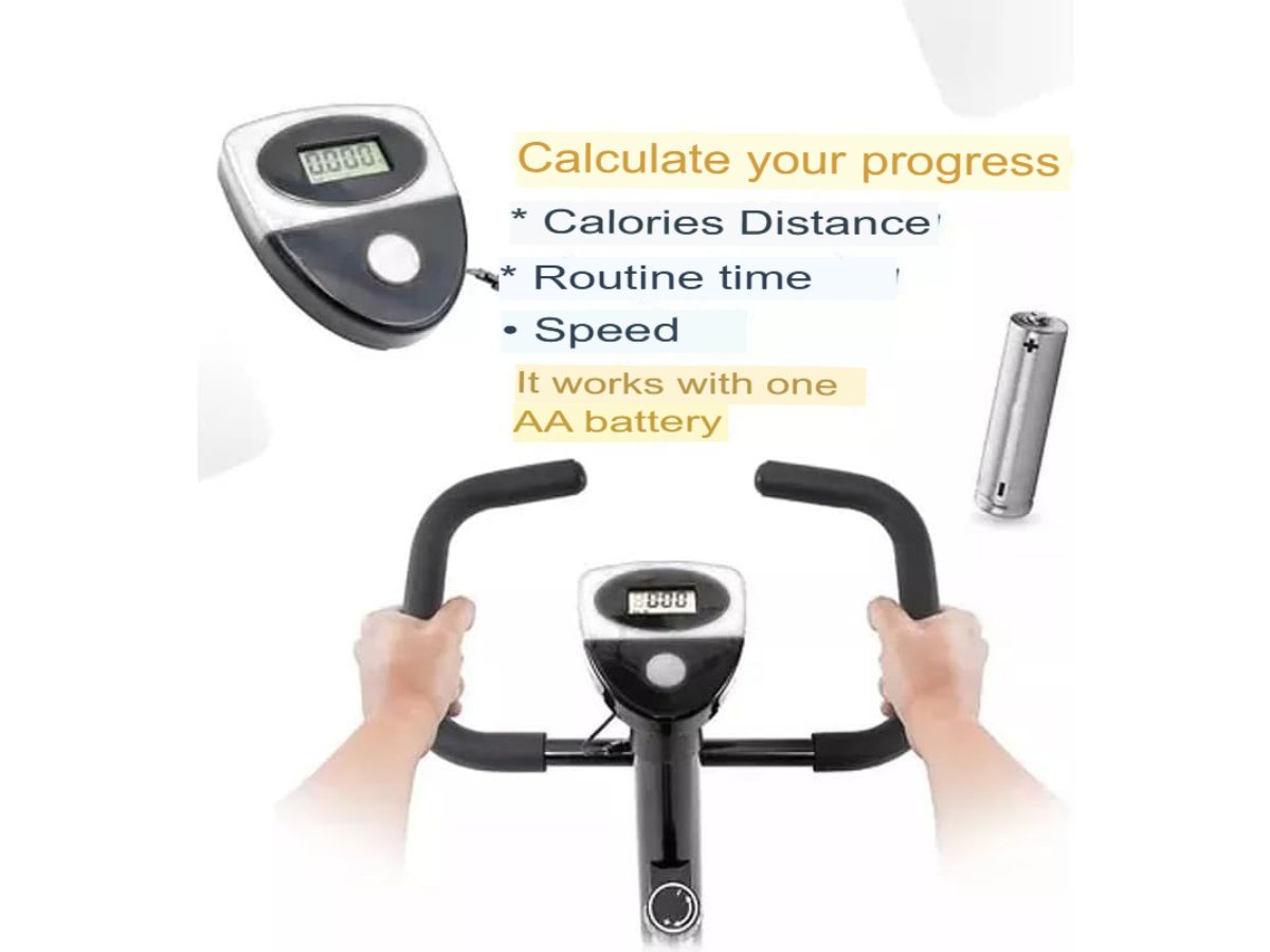 Exercise bike in home gym setting with wooden floor