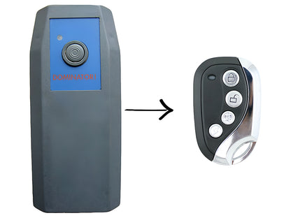 Back of Dominator garage remote with battery compartment open