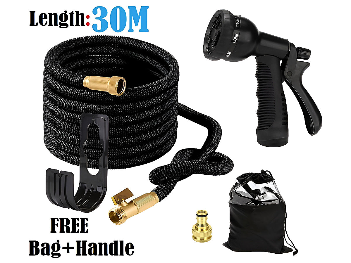 Expandable garden hose on garden hose holder in sunny garden