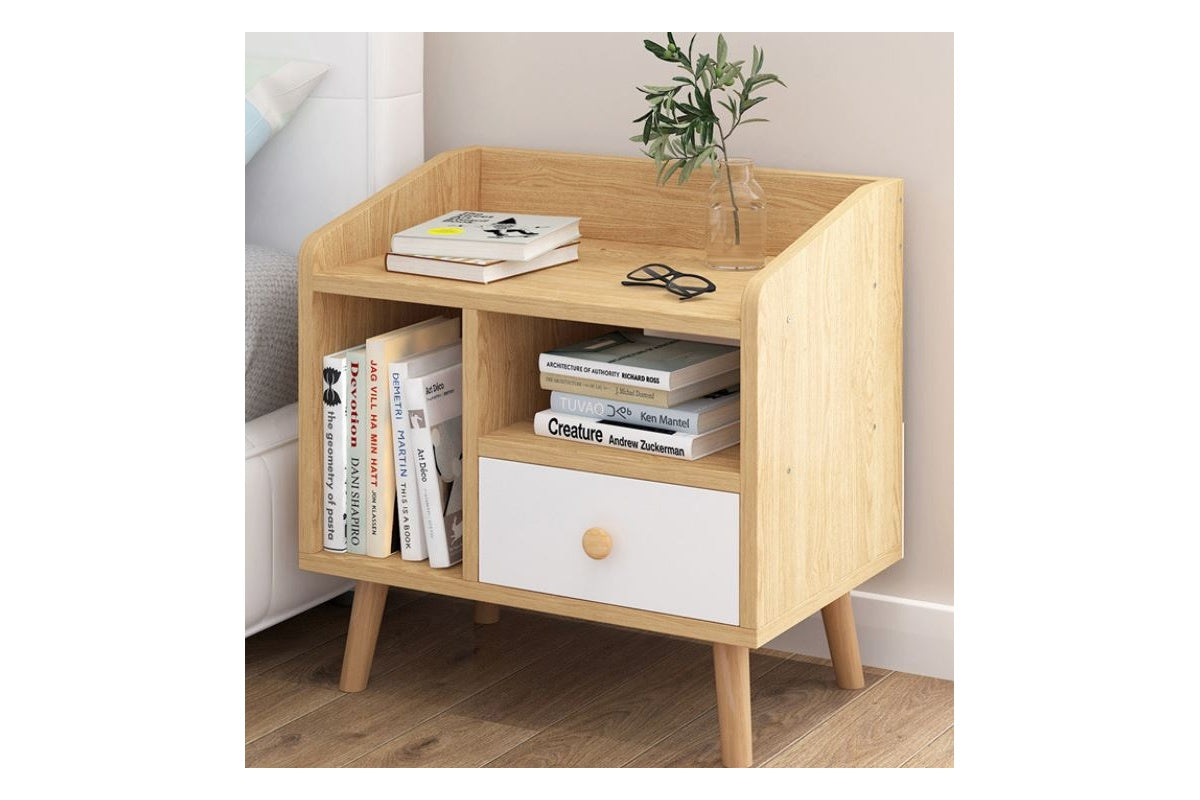 Close up of round wooden handle on bedside table drawer