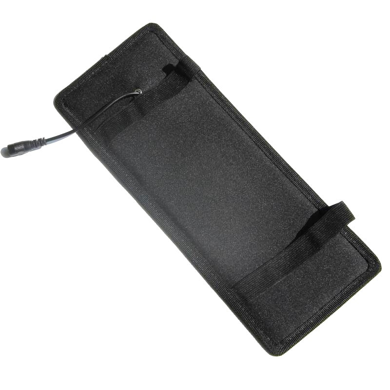 Solar car battery charger 12V mounted on camper window with suction cups