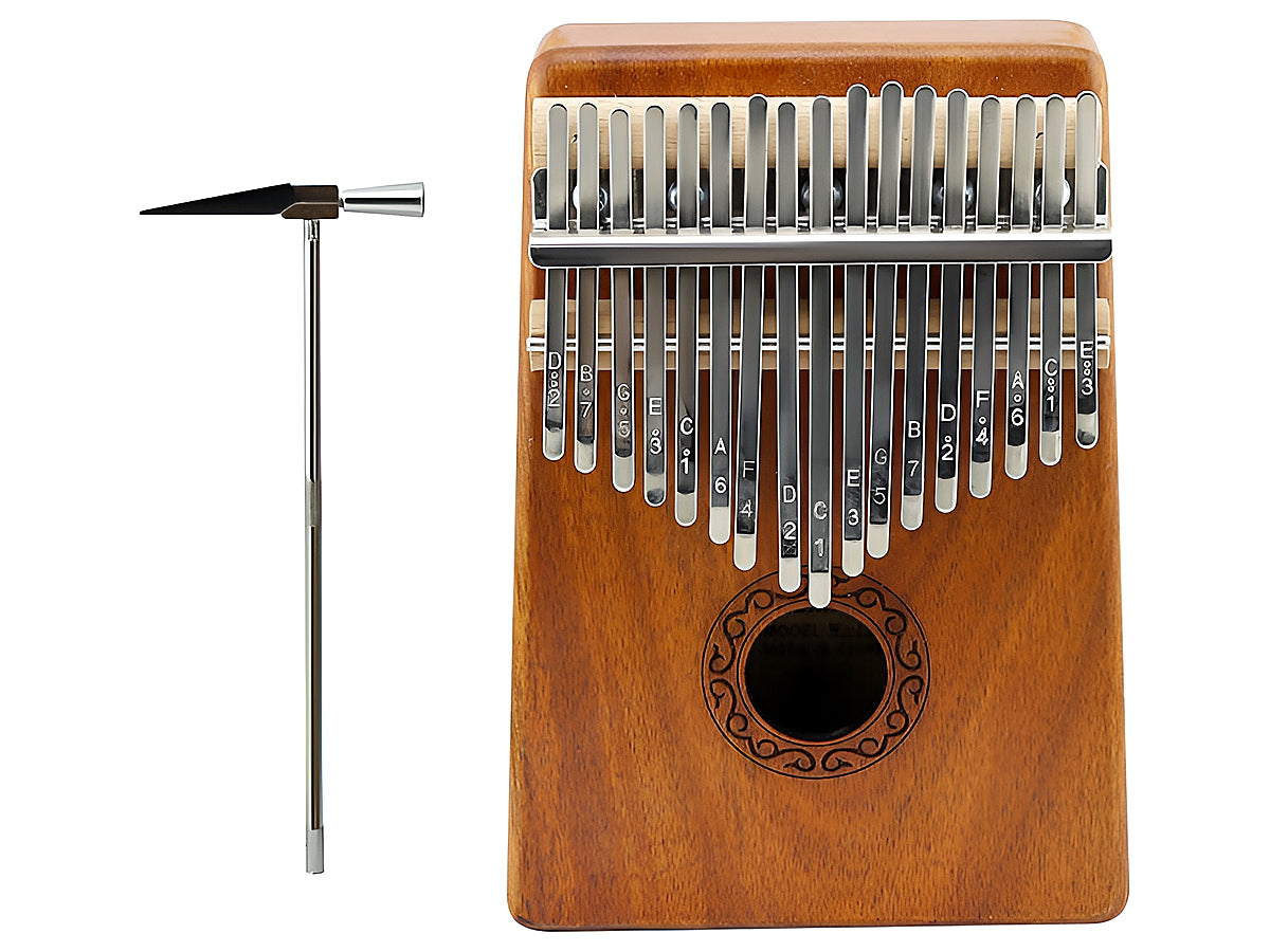 Side view of portable kalimba thumb piano with ergonomic hand-rest curve