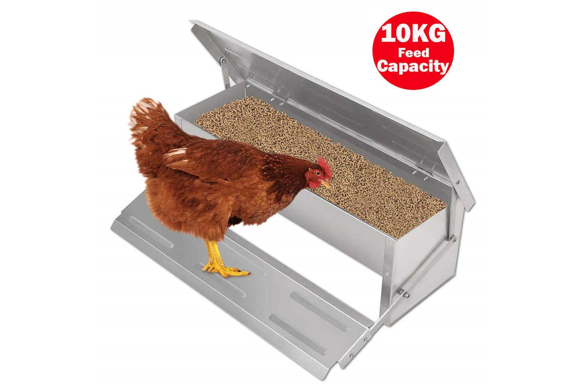 Side view of chicken feeder with protective lid closed