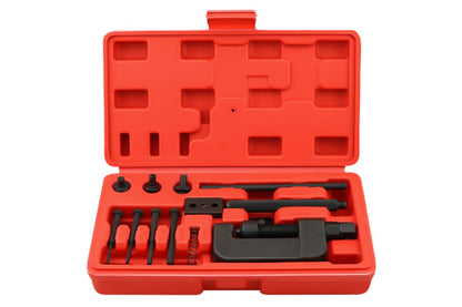 Close-up of chain breaker tool kit handle and lever in use