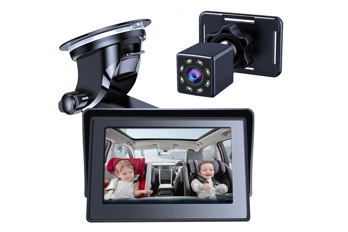 Black baby monitor camera mounted on car headrest
