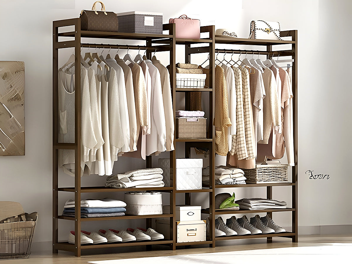 Free standing bamboo clothes rack in bedroom setting