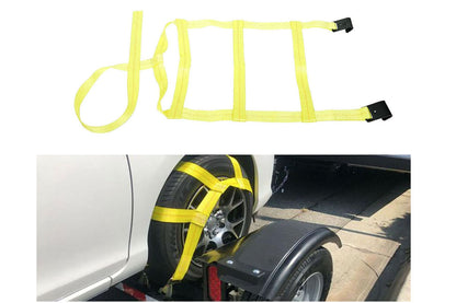 Car tire straps tie downs in use on a tow dolly with vehicle wheels