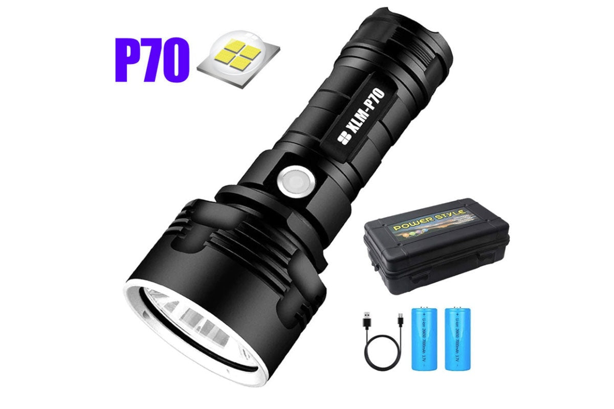 Side view of tactical flashlight with aluminium body and switch
