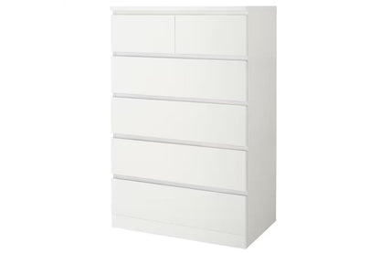 Side angle of tall boy drawers highlighting white melamine finish
