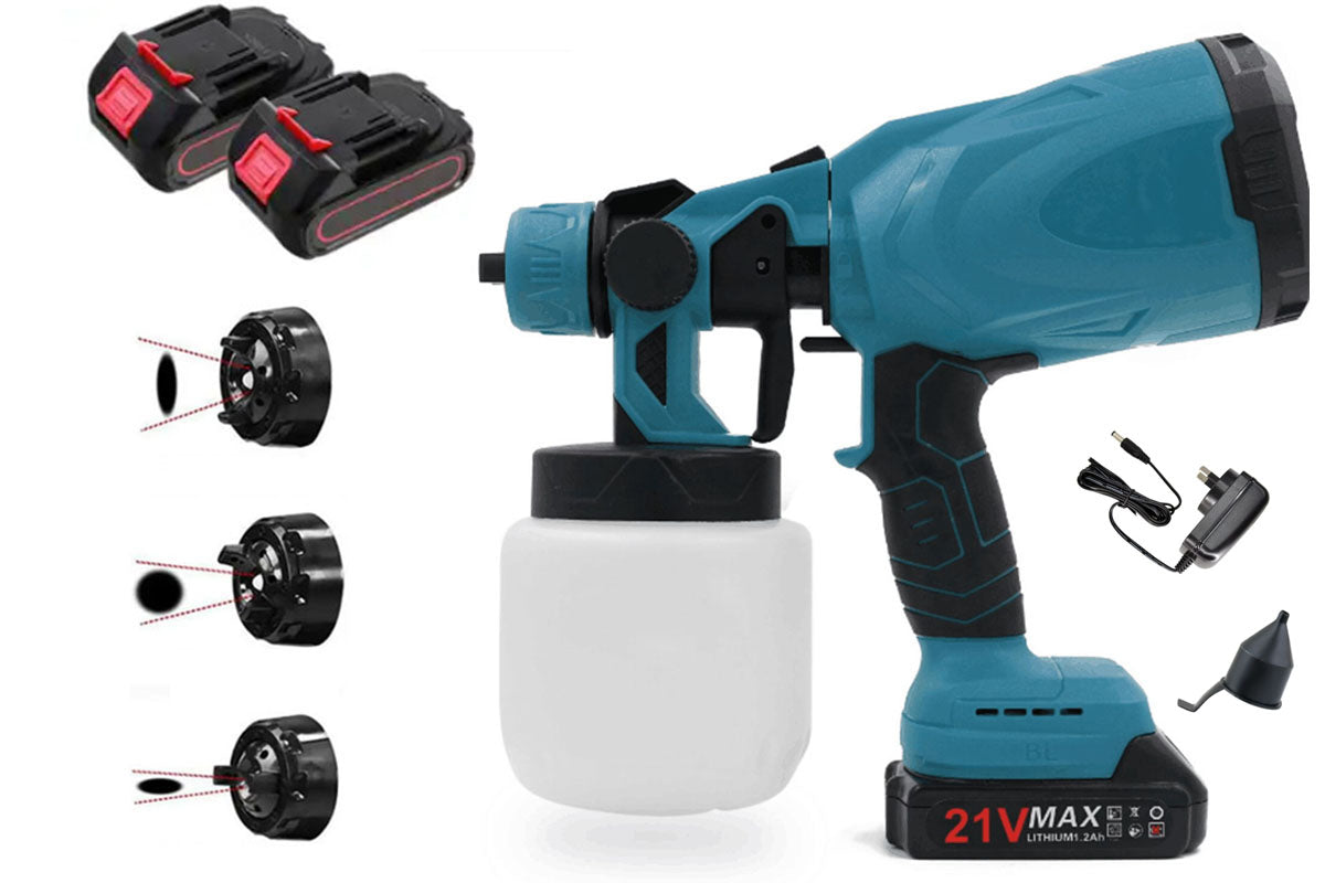 Paint sprayer gun held by user painting ceiling