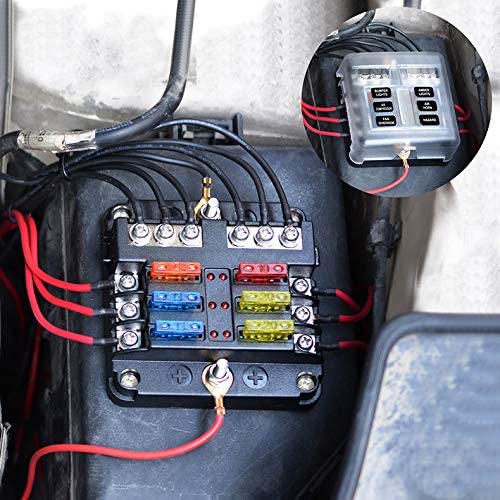 Side angle of fuse block displaying negative bus connections