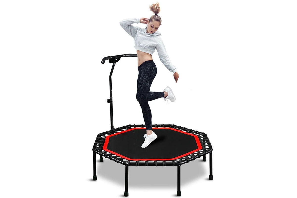 Side view of trampoline rebounder with adjustable handle at medium height