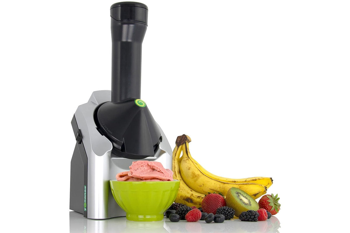 Side angle of ice cream maker dessert maker showing plunger