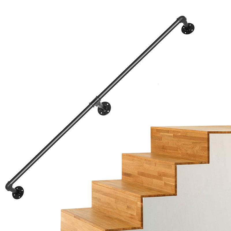 Industrial pipe handrail showing wall fixing screws