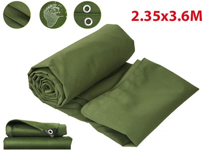 Reinforced eyelets on green tarpaulin tarp for secure fixing