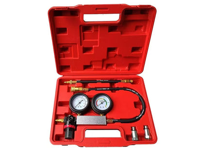 Cylinder leak detector in use on a petrol engine cylinder