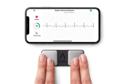 Close-up of KardiaMobile ECG heart monitor finger sensors in silver