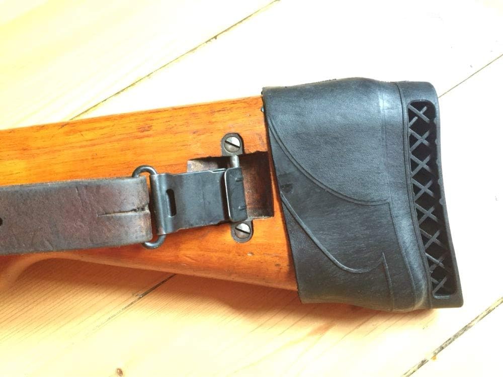 Rifle recoil pad showing lightweight compact design in hand