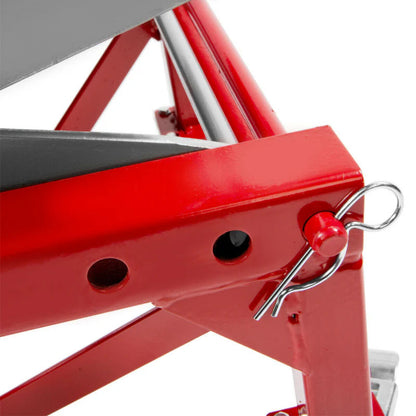 Motorcycle lift jack lifting a dirt bike with stable balance