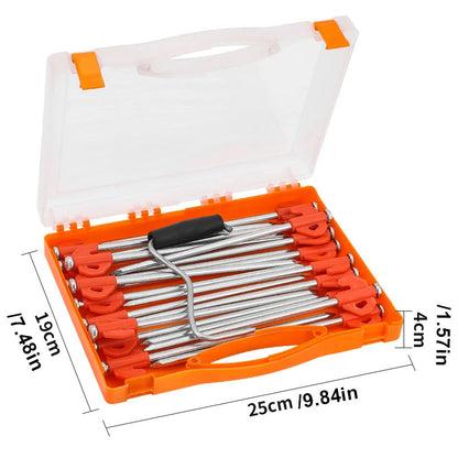 Camping tent peg securing tent rope on sandy beach