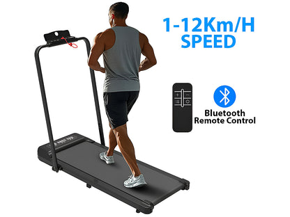 User walking on compact flat treadmill at home office