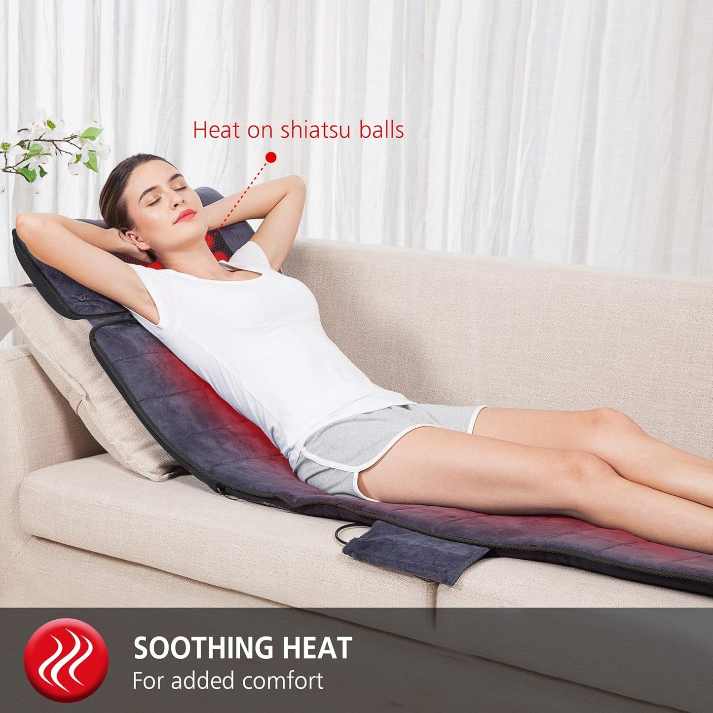 Massage mattress folded on bed ready for use in NZ living room