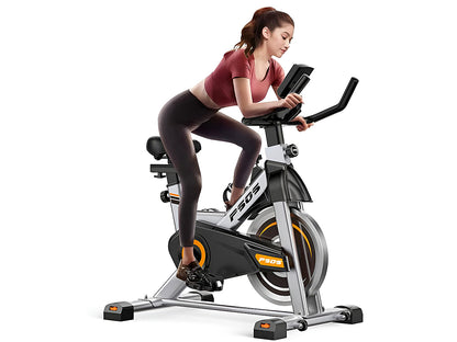 Comfortable padded seat on adjustable spin bike for home use