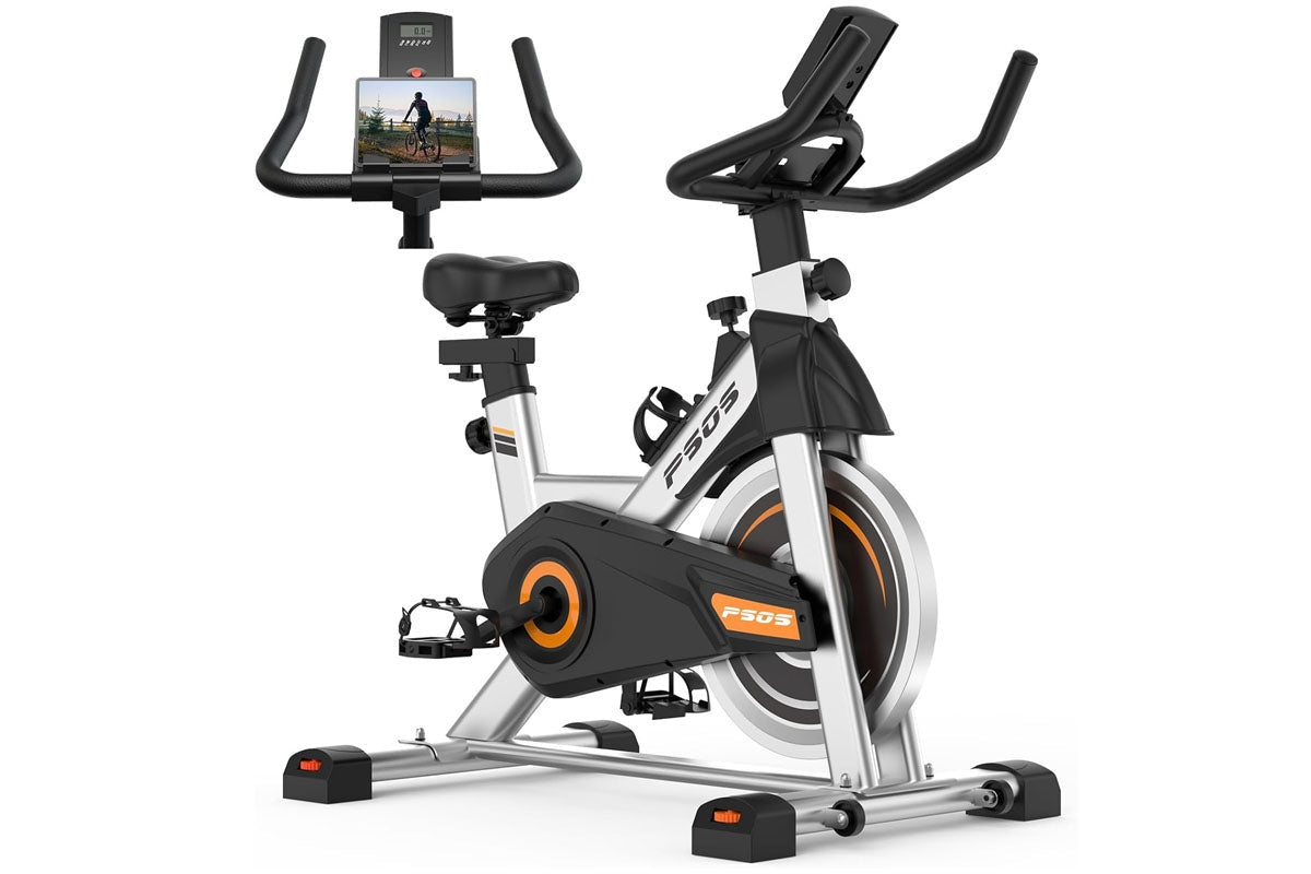 Close up of exercise bike digital display tracking speed and calories