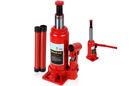 Hydraulic bottle jack 5 ton lifting a car in a garage