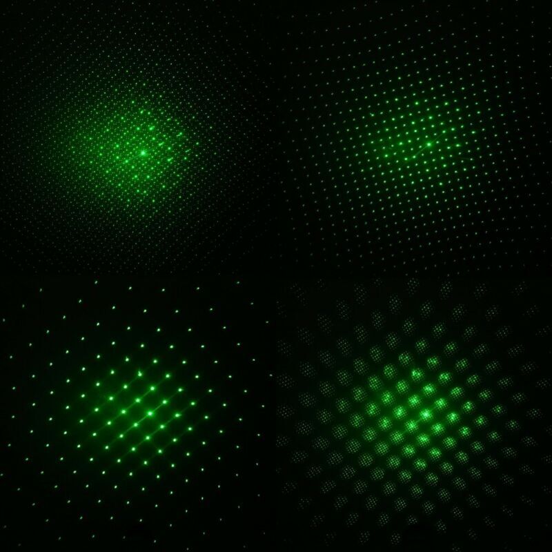 Green laser pointer pen highlighting star in night sky
