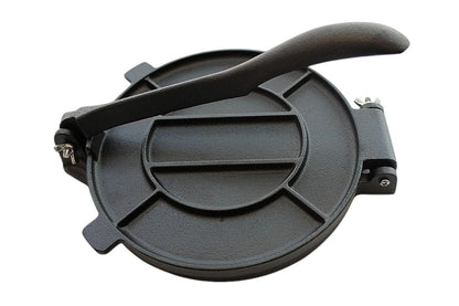 Side angle of cast iron tortilla press with foldable handle