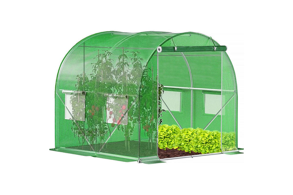 Side angle of walk in greenhouse showing zipper door
