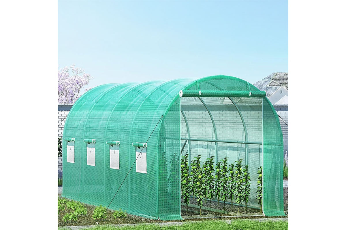 Side angle of walk in greenhouse showing zipper door