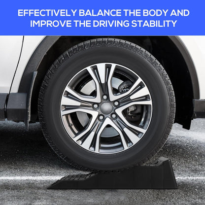 Camper wheel chocks placed under caravan tyre for stability