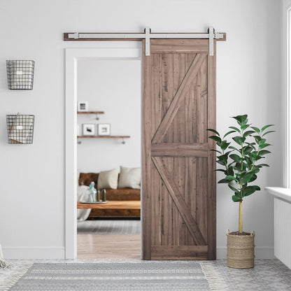 Barn door hardware stainless kit installed on wooden door