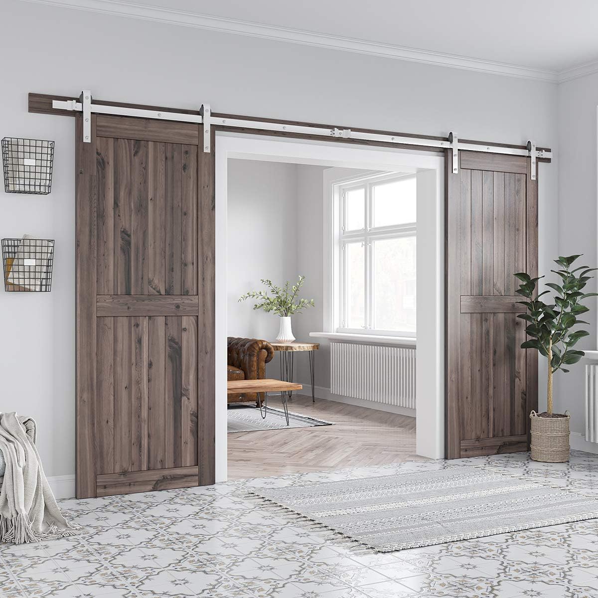 Top angle of barn door hardware floor guides in use