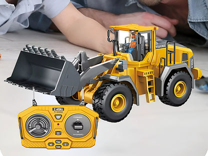 Top angle of RC bulldozer loader toy with remote control visible