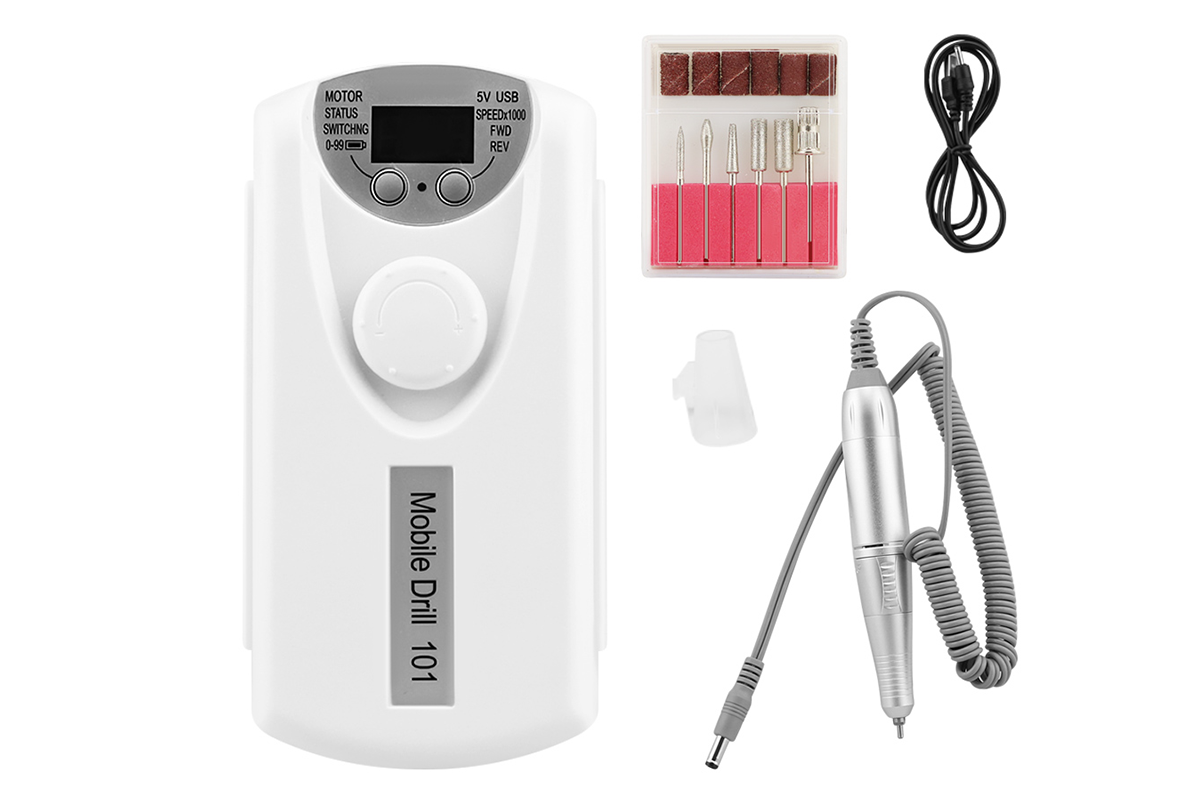 Close up of nail drill handpiece with steel drill bit attached
